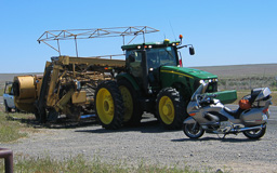 Defenseless Motorcycle Attacked by Giant Farm Implement