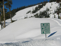 Random signs buried in snow.