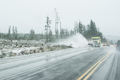 Winter snowplow on road to Kingston, WA