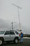 Barry WA7KVC with M2 seven-element 2-meter beam on 15' mast at Sekiu, WA