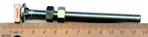 Carriage bolt with magnet, shown with ruler
