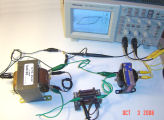 Photograph of messy electronics workbench