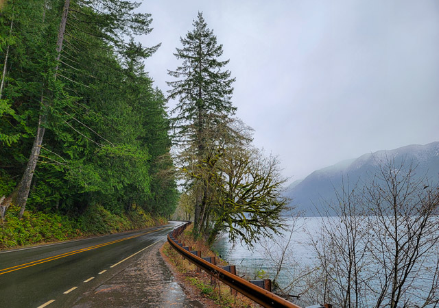 Scenic slow winding road along the shore of Lake Crescent on the way to CN78